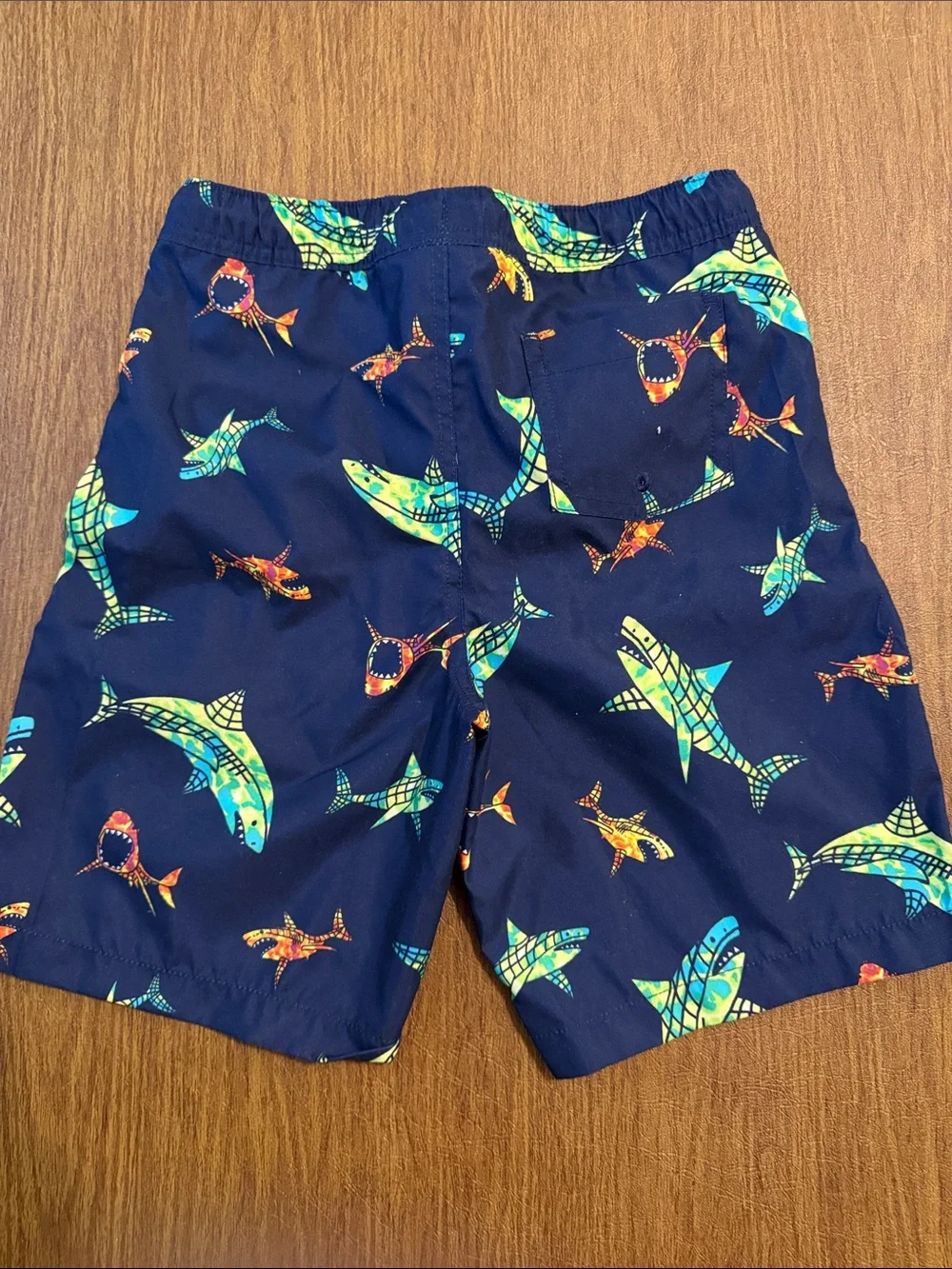 Lands End boys printed volley swim trunks. New without tags. Never worn.